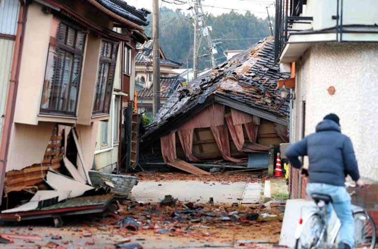 ‘Battle against time’ to find quake survivors as Japan lifts tsunami warnings and death toll rises